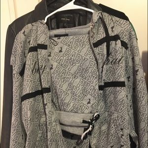 Baby phat jogging suit it’s black n grey it’s an 2x which is a xl